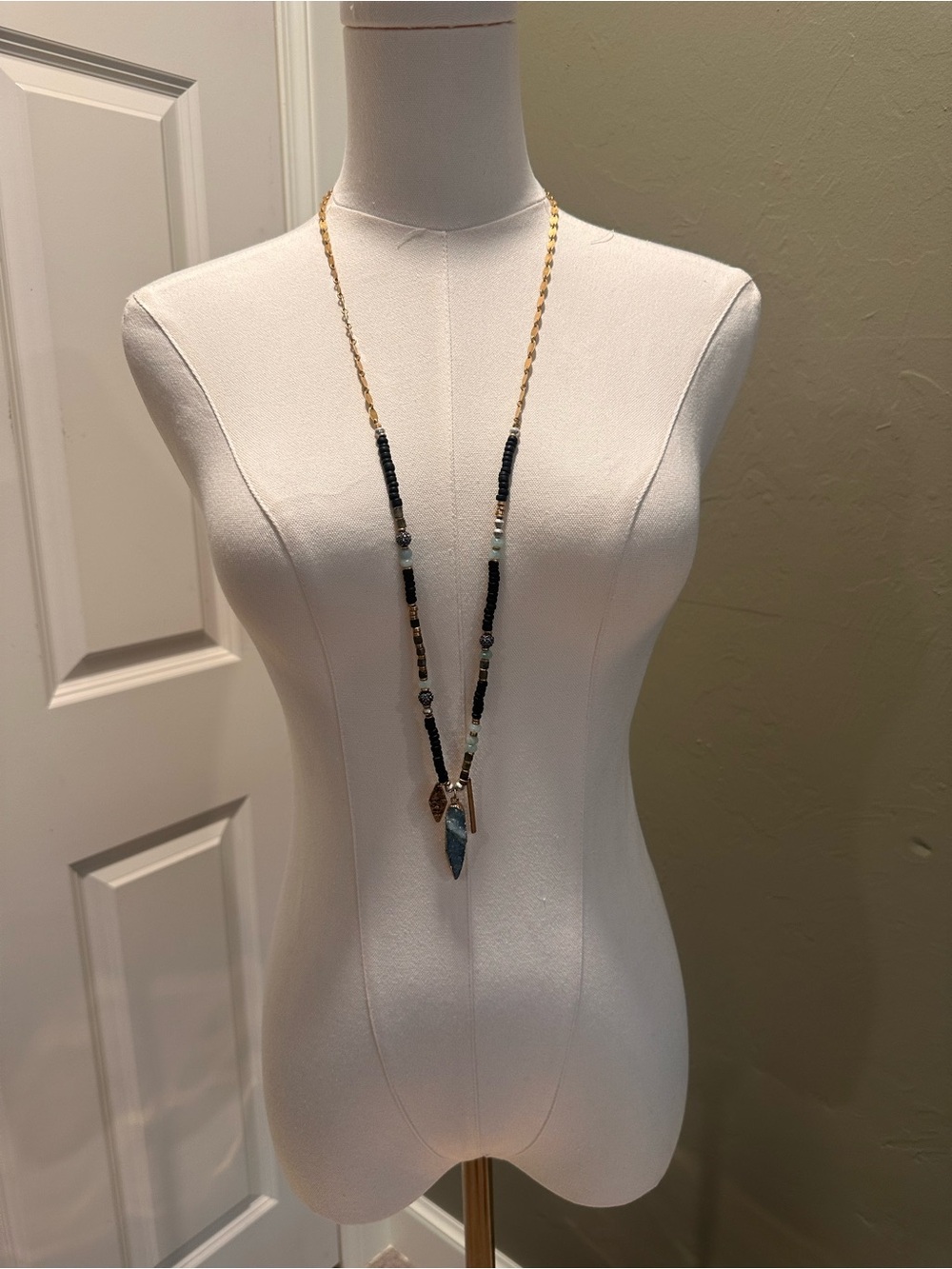 Stella & Dot Black and Gold Long Beaded Necklace with Blue Pendant